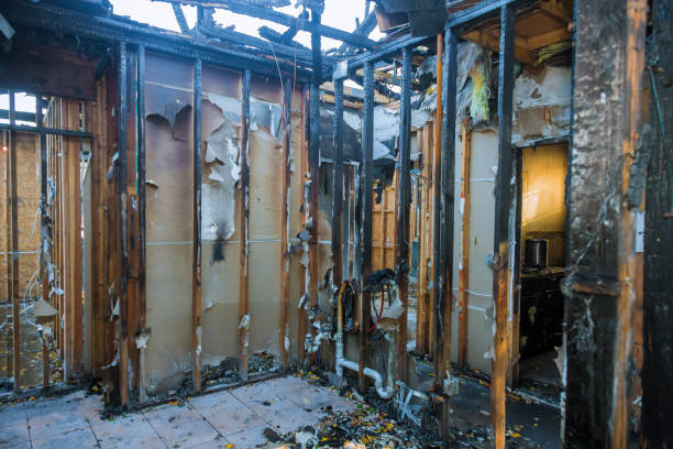 Professional Emergency Fire Damage Restoration technician working in Carrollton, TX